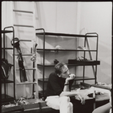 Pierre Cardin, seated, at work in the studio