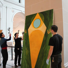 Shura Chernozatonskaya and Museum staff install Devotion