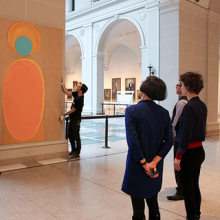 Shura Chernozatonskaya and curator Eugenie Tsai work with Museum staff to install Art