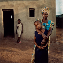 Jonathan C. Torgovnik: Valentine with her daughters Amelie and Inez, Rwanda