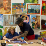 Adults participating in an art class