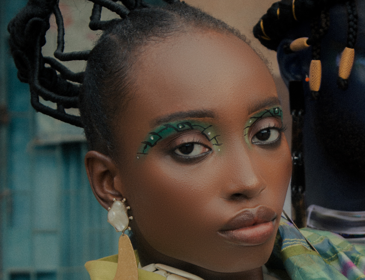 A dynamic Afrofuturist fashion show, featuring models adorned in