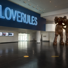 <p><small>Martha A. and Robert S. Rubin Lobby. Installation view: Hank Willis Thomas. <i>LOVE RULES</i>, 2018. © Hank Willis Thomas; KAWS. <em>ALONG THE WAY</em>, 2013. Brooklyn Museum; Gift in honor of Arnold Lehman, TL2015.27a-b. © KAWS, courtesy of the Mary Boone Gallery</small></p>