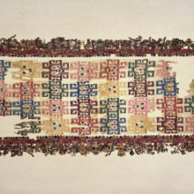 <p>Nasca artists. <i>Mantle, known as the Paracas Textile</i>, 100–300. Peru. Cotton, camelid fiber, 24<sup>1</sup>⁄<sub>2</sub> x 58<sup>1</sup>⁄<sub>4</sub> in. (62.2 × 148 cm). Brooklyn Museum, John Thomas Underwood Memorial Fund, 38.121</p>