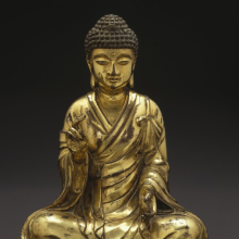 <p><em>Seated Buddha Shakyamuni</em>, 965–1025, Liao Dynasty. China. Gilt bronze, 8<sup>1</sup>⁄<sub>2</sub> x 7<sup>1</sup>⁄<sub>4</sub> x 4<sup>3</sup>⁄<sub>4</sub> in. (21.6 × 18.4 × 12.1 cm). Brooklyn Museum; Gift of the Asian Art Council in memory of Mahmood T. Diba; Mary Smith Dorward Fund, 1999.42. (Photo: Brooklyn Museum)</p>