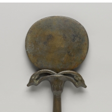 <p><em>Mirror with Handle in Form of Umbel with Two Ibex Heads</em>, circa 1539–1292 <small>B.C.E</small>. Bronze, Other (handle): 4<sup>1</sup>/<sub>4</sub> x 3<sup>1</sup>/<sub>2</sub> x <sup>3</sup>/<sub>4</sub> in. (10.7 x 9 x 2 cm). Charles Edwin Wilbour Fund, 75.168a–b. (Photo: Jonathan Dorado, Brooklyn Museum)</p>