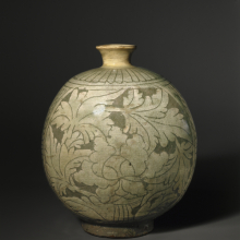 <p><em>Bottle with Peony Decoration</em>. Korea, Joseon dynasty, mid- to late 15th century. Stoneware with slip decoration under celadon glaze, 8<sup>5</sup>/<sub>8</sub> x 7 x 6 in. (22 x 17.8 x 15.2 cm). Brooklyn Museum, Ella C. Woodward Memorial Fund, 75.61. (Photo: Brooklyn Museum)</p>