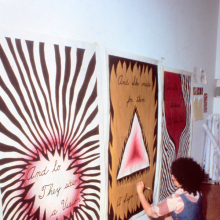 
                           
                           Judy Chicago Designing the Entry Banners for “The Dinner Party,” 1978. Courtesy of Through the Flower Archive
                           
                           
