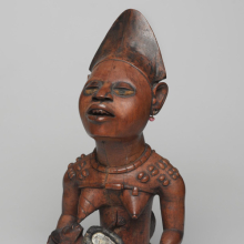 <p>Kongo (Yombe subgroup) artist. <em>Power Figure (nkisi): Woman and Child</em>, 19th century. Wood, glass, upholstery studs, metal, metal and glass buttons, resin, 11 × 5 × 4<sup>1</sup>/<sub>2</sub> in. (27.9 × 12.7 × 11.4 cm). Brooklyn Museum; Museum Expedition 1922, Robert B. Woodward Memorial Fund, 22.1138. (Photo: Brooklyn Museum)</p>