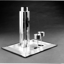 <p>Norman Bel Geddes, designer (American, 1893–1958). Revere Copper and Brass Company, manufacturer, Rome, New York (founded 1928). <em>”</em><em>Skyscraper”</em> Cocktail set and serving tray, designed 1934, manufactured 1935. Chrome-plated metal, 12<sup>3</sup>/<sub>4</sub> × 3<sup>5</sup>/<sub>16</sub> × 3<sup>5</sup>/<sub>16</sub> in. (32.4 × 8.4 × 8.4 cm). Gift of Paul F. Walter, 83.108.5a-c, .6, .14. (Photo: Brooklyn Museum)</p>