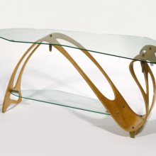 <p>Carlo Molino, designer (Italian, 1905–1973). Apelli F.-Varesio L & Co., manufacturer, Turin, Italy (mid-20th century). Low Table, circa 1949. Maple plywood, glass, brass, 20<sup>1</sup>/<sub>2</sub> × 47<sup>1</sup>/<sub>2</sub> × 21<sup>1</sup>/<sub>4</sub> in. (52.1 × 120.7 × 54 cm). Gift of the Italian Government, 54.64.231a-c. (Photo: Brooklyn Museum)</p>
