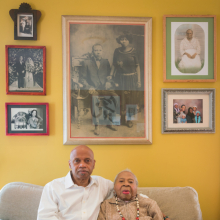<p>Tarabu Betserai Kirkland at home in Los Angeles with his mother, Mamie Lang Kirkland, 109, who fled Mississippi at age seven. 2017. (Photo: Kris Graves for the Equal Justice Initiative)</p>