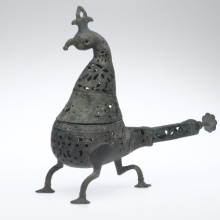<p>Peacock-Shape Incense Burner, Iran, Seljuk period, 12th–13th century. Copper alloy; pierced and engraved, 10 1/2 × 11 1/2 in. (26.7 × 29.2 cm). Brooklyn Museum, Special Middle Eastern Art Fund, 70.98.1. (Photo: Brooklyn Museum)</p>