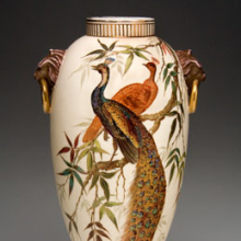 <p>Edward Lycett (American, b. England, 1833–1910). Faience Manufacturing Company (1881–92). <i>Vase</i>, 1886–90. Cream-colored earthenware painted over ivory glazed ground with polychrome enamels; flat and raised gold paste decoration. Collection of Michael and Marjorie Loeb</p>