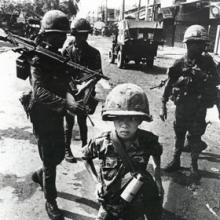 <p>Philip Jones Griffiths (Welsh, 1936–2008). <em>Called “Little Tiger” for killing two “Vietcong women cadre”—his mother and teacher, it was rumored, Vietnam</em>, 1968. Gelatin silver print, 11 × 7<sup>15</sup>⁄<sub>16</sub> in. (27.9 × 20.2 cm). Philip Jones Griffiths Foundation, courtesy of Howard Greenberg Gallery. © Philip Jones Griffiths / Magnum Photos</p>