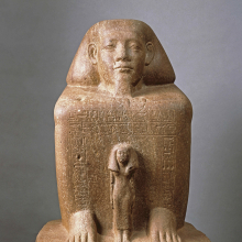 <p><em>Block Statue of Senwosret-senebnefny</em>. Egypt, exact provenance not known. Middle Kingdom, late Dynasty 12, circa 1836–1759 <small>B.C.E.</small> Quartzite, 26<sup>7</sup>⁄<sub>8</sub> x 16<sup>5</sup>⁄<sub>16</sub> x 18<sup>1</sup>⁄<sub>8</sub> in. (68.3 × 41.5 × 46 cm). Brooklyn Museum, Charles Edwin Wilbour Fund, 39.602</p>