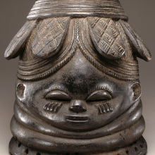 <p>The Nguabu Master (Mende). <em>Helmet Mask for Sande Society</em> <em>(Ndoli Jowei),</em> late 19th-early 20th century. Nguabu, Moyamba district, Southern province, Sierra Leone. Wood, pigment, 15<sup>1</sup>⁄<sub>2</sub> x 9<sup>1</sup>⁄<sub>4</sub> x 10<sup>1</sup>⁄<sub>4</sub> in. (39.4 x 23.5 x 26 cm). Brooklyn Museum, Carll H. de Silver Fund, 74.64. Creative Commons-BY. Photo: Brooklyn Museum</p>