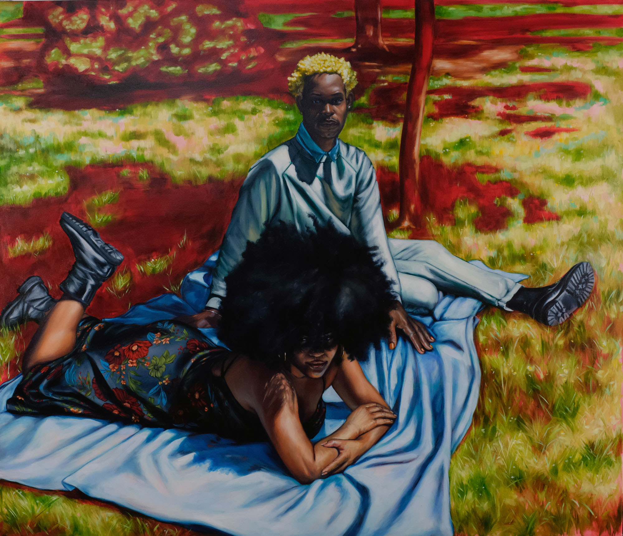 A painting of two people outside on a blanket