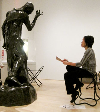 <p>Student drawing in the galleries</p>