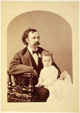 <em>"Portrait of Susie Southwick on her father's lap."</em>, 1865-1905. color transparency, 4x5in. Brooklyn Museum. (CS71_So8_B39_Southwick_Susie.jpg