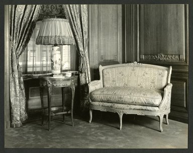 <em>"Weil-Worgelt apartment; settee and end table with lamp in French eighteenth-century revival style."</em>. Bw photographic print, 5 x 7 in (13 x 16 cm). Brooklyn Museum, CHART_2011. (NK2004_W42_Weil_Worgelt_apartment_page11.jpg