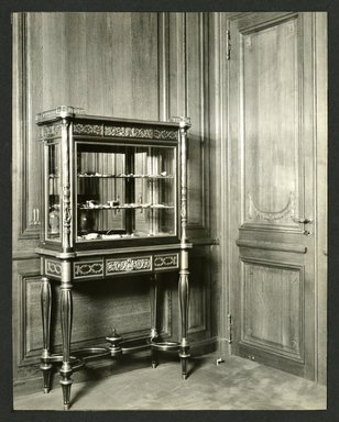 <em>"Weil-Worgelt apartment; vitrine in French eighteenth-century revival style."</em>. Bw photographic print, 5 x 7 in (13 x 16 cm). Brooklyn Museum, CHART_2011. (NK2004_W42_Weil_Worgelt_apartment_page13.jpg