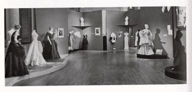 <em>"View of the recent exhibition of the gift made by Mrs. Millicent H. Rogers of original designs created for her by the American dressmaker, Charles James."</em>, 1949. Printed material, 2.5 x 5.75 in. (6 x 14.5 cm). Brooklyn Museum. (PER_Brooklyn_Museum_Bulletin_1949_v10_no2_p14_Rogers_installation_SL1.jpg