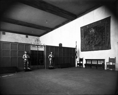 <em>"Brooklyn Museum building: interior. View: Painting and Sculpture: Italian Renaissance Hall [02], 1926. Italian Room with tapestry and suits of armor. Floor: 3."</em>, 1926. Glass negative 8x10in, 8 x 10 in. Brooklyn Museum, CHART_2013. (Photo: Brooklyn Museum, PHO_INT_VIEW_PSC_Italian_Renaissance_Hall_02_001_glass_bw.jpg