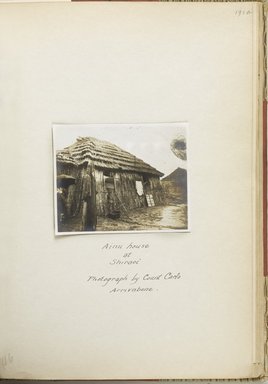 <em>"Ainu house at Shiraoi, photograph by Count Carlo Arrivabene."</em>, 1912. Bw photographic print. Brooklyn Museum, Japan Society. (S01_02.01.018_p191a_Ainu_House_Shiraoi_1912_PS9.jpg