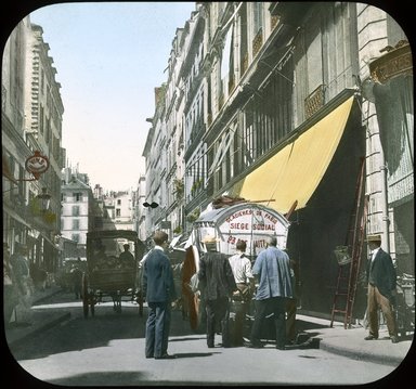 <em>"Paris Exposition: street scene [Rue Gomboust near Saint Honore Market], Paris, France, 1900"</em>, 1900. Lantern slide 3.25x4in, 3.25 x 4 in. Brooklyn Museum, Goodyear. (Photo: Brooklyn Museum, S03i2059l01_SL1.jpg