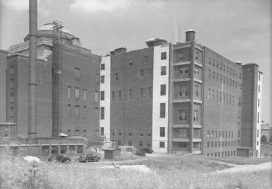 <em>"Brooklyn Museum: exterior. View of  the back of the museum from the southwest, showing the rear façade of the Central section and East Wing, 1940."</em>, 1940. Bw negative 5x7in. Brooklyn Museum, Museum building. (Photo: Brooklyn Museum, S06_BEEi032.jpg
