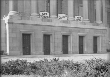 <em>"Brooklyn Museum: exterior. View of  the Central section entrance from the entrance driveway, showing Art School registration sign above the doors, 09/25/1957."</em>, 1957. Bw negative 5x7in. Brooklyn Museum, Museum building. (Photo: Brooklyn Museum, S06_BEEi038.jpg