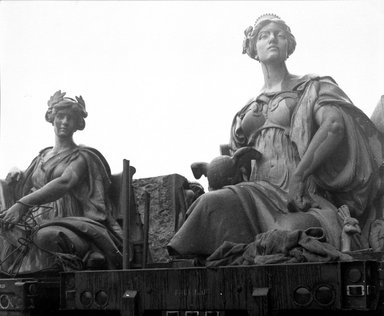 <em>"Brooklyn Museum: exterior. View of the installation of Daniel Chester French's Brooklyn and Manhattan statues at the front entrance of the museum, close-up view of statues on flatbeds, 1964."</em>, 1964. Bw copy negative 4x5in, 4 x 5in (10.2 x 12.7 cm). Brooklyn Museum, Museum building. (Photo: Brooklyn Museum, S06_BEEi051.jpg