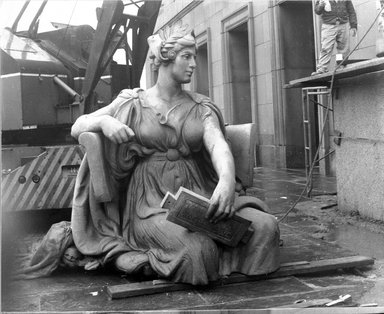 <em>"Brooklyn Museum: exterior. View of the installation of Daniel Chester French's Brooklyn and Manhattan statues at the front entrance of the museum, showing Brooklyn statue on the pavement, 1964."</em>, 1964. Bw copy negative 4x5in, 4 x 5in (10.2 x 12.7 cm). Brooklyn Museum, Museum building. (Photo: Brooklyn Museum, S06_BEEi052.jpg