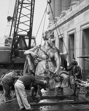 <em>"Brooklyn Museum: exterior. View of the installation of Daniel Chester French's Brooklyn and Manhattan statues at the front entrance of the museum, showing preparation to hoist Brooklyn statue, 1964."</em>, 1964. Bw copy negative 4x5in, 4 x 5in (10.2 x 12.7 cm). Brooklyn Museum, Museum building. (Photo: Brooklyn Museum, S06_BEEi053.jpg
