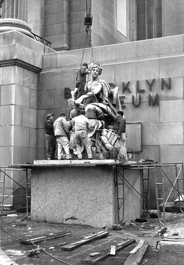<em>"Brooklyn Museum: exterior. View of the installation of Daniel Chester French's Brooklyn and Manhattan statues at the front entrance of the museum, showing Brooklyn statue on the pedestal, 1964."</em>, 1964. Bw copy negative 4x5in, 4 x 5in (10.2 x 12.7 cm). Brooklyn Museum, Museum building. (Photo: Brooklyn Museum, S06_BEEi055.jpg