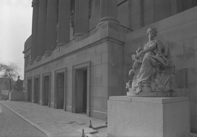 <em>"Brooklyn Museum: exterior. Close-up view of the Central section entrance from the front of the museum, showing Daniel Chester French's Brooklyn statue in the foreground and Manhattan statue in the background, 07/1964."</em>, 1964. Bw negative 5x7in. Brooklyn Museum, Museum building. (Photo: Brooklyn Museum, S06_BEEi059.jpg