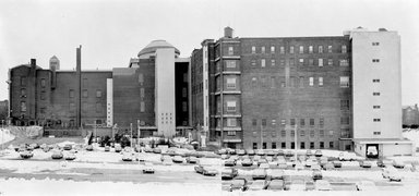 <em>"Brooklyn Museum: exterior. View of the back of the Museum from the south, showing complete rear façade before the East Wing service extension with the parking lot in the foreground, ca. 1965."</em>, 1965. Bw negative 8x10in, 8 x 10in (20.3 x 25.4 cm). Brooklyn Museum, Museum building. (Photo: Brooklyn Museum, S06_BEEi069.jpg