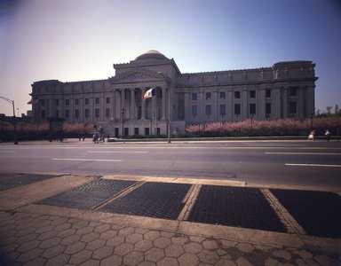 <em>"Brooklyn Museum: exterior. View of the Eastern Parkway façade from the north, showing cherry blossoms and Eastern Parkway in the foreground, 05/1983."</em>, 1983. Color transparency 8x10in, 8 x 10in (20.3 x 25.4 cm). Brooklyn Museum, Museum building. (Photo: Brooklyn Museum, S06_BEEi106.jpg
