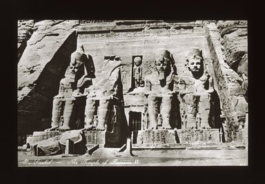 <em>"Views, Objects: Egypt. Abu Simbel. View 15: Façade, Temple of Ramses II at Abu Simbel. 19th Dy."</em>. Lantern slide 3.25x4in, 3.25 x 4 in. Brooklyn Museum, lantern slides. (S10_08_Egypt_AbuSimbel15_SL1.jpg