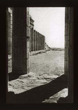 <em>"Views, Objects: Egypt. Deir-El-Bahari. View 04: Fore Court of Temple of Hatshepsut. Dy. 18. Der el-Bahri."</em>. Lantern slide 3.25x4in, 3.25 x 4 in. Brooklyn Museum, lantern slides. (S10_08_Egypt_Deir-El-Bahari04_SL1.jpg