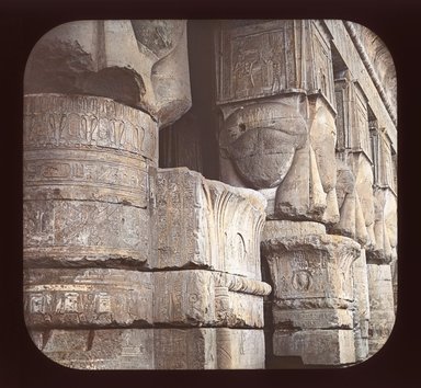 <em>"Views, Objects: Egypt. Denderah. View 02: Columns of Façade, Temple of Denderah."</em>. Lantern slide 3.25x4in, 3.25 x 4 in. Brooklyn Museum, lantern slides. (Photo: T. H. McAllister, New York, S10_08_Egypt_Denderah02_SL1.jpg