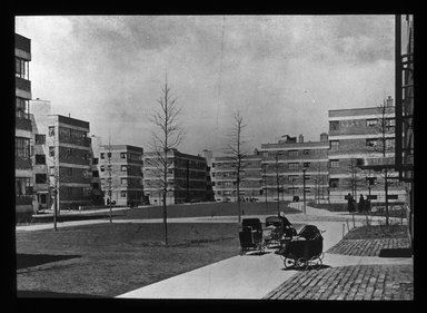 <em>"Views: Brooklyn, Long Island, Staten Island. Brooklyn scenes; buildings. View 010: Williamsburg Houses, detail of housing group."</em>. Lantern slide 3.25x4in, 3.25 x 4 in. Brooklyn Museum, CHART_2011. (S10_11_Brooklyn_LI_SI_Brooklyn_Scenes_Buildings010.jpg