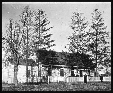 <em>"Views: Brooklyn. Various. View 017: The Hubbard Homestead near Flatlands Church."</em>. Lantern slide 3.25x4in, 3.25 x 4 in. Brooklyn Museum, CHART_2011. (Photo: John H. Norris, S10_12_Brooklyn_Various017.jpg