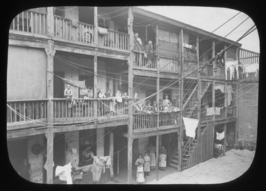 <em>"Views: Brooklyn. Various. View 032: 'Big Alley' Rear view of tenement in Gold St near Plymouth. (Entered by alleyway at left hand corner.)"</em>. Lantern slide 3.25x4in, 3.25 x 4 in. Brooklyn Museum, CHART_2011. (S10_12_Brooklyn_Various032.jpg