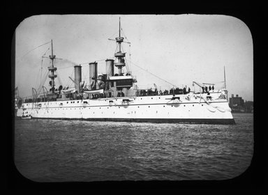 <em>"Views: U.S. Columbian Celebration: Oct. 1892. View 011: USS New York leaving Brooklyn Navy Yard for Rio."</em>. Lantern slide 3.25x4in, 3.25 x 4 in. Brooklyn Museum, CHART_2011. (S10_20_US_Columbian_Celebration_Oct_1892.011.jpg