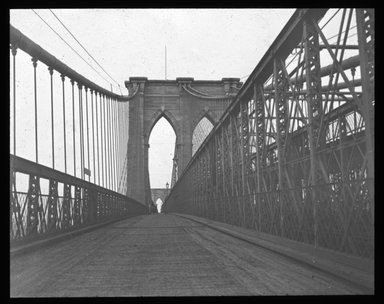 <em>"Views: U.S., Brooklyn. Brooklyn Bridge. View 003: Looking to the carriage-way; from Brooklyn tower."</em>. Lantern slide 3.25x4in, 3.25 x 4 in. Brooklyn Museum, CHART_2011. (S10_21_US_Brooklyn_Brooklyn_Bridge003.jpg