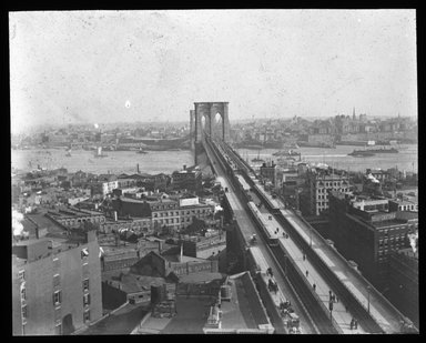 <em>"Views: U.S., Brooklyn. Brooklyn Bridge. View 006: Bridge and Brooklyn; form New York."</em>. Lantern slide 3.25x4in, 3.25 x 4 in. Brooklyn Museum, CHART_2011. (S10_21_US_Brooklyn_Brooklyn_Bridge006.jpg