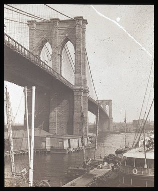 <em>"Views: U.S., Brooklyn. Brooklyn Bridge. View 007: Cobweb and the flies; from South Street, NY."</em>. Lantern slide 3.25x4in, 3.25 x 4 in. Brooklyn Museum, CHART_2011. (S10_21_US_Brooklyn_Brooklyn_Bridge007.jpg