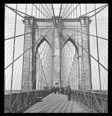 <em>"Views: U.S., Brooklyn. Brooklyn Bridge. View 010: Brooklyn tower and footpath."</em>. Lantern slide 3.25x4in, 3.25 x 4 in. Brooklyn Museum, CHART_2011. (S10_21_US_Brooklyn_Brooklyn_Bridge010.jpg